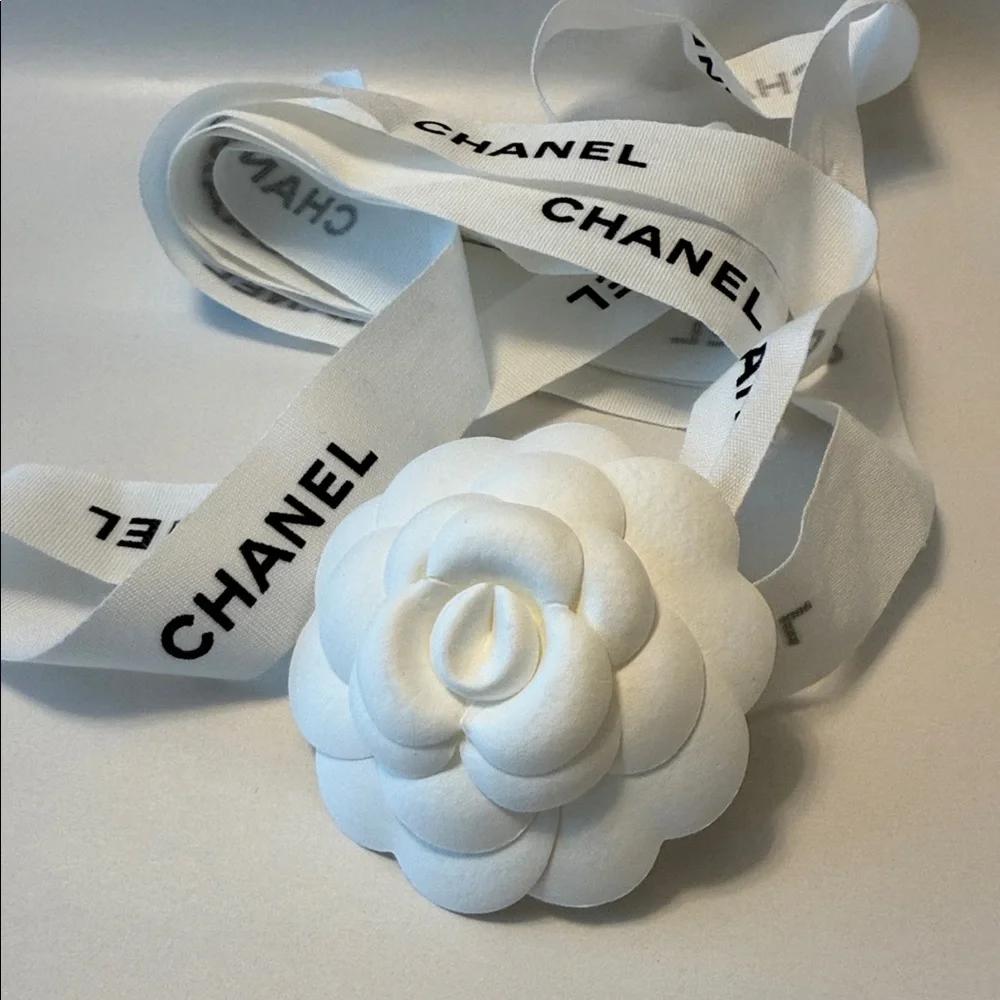 CHANEL 1 CAMELIA FLOWER AND Silver Chanel printed RIBBON,  plus Chanel card.